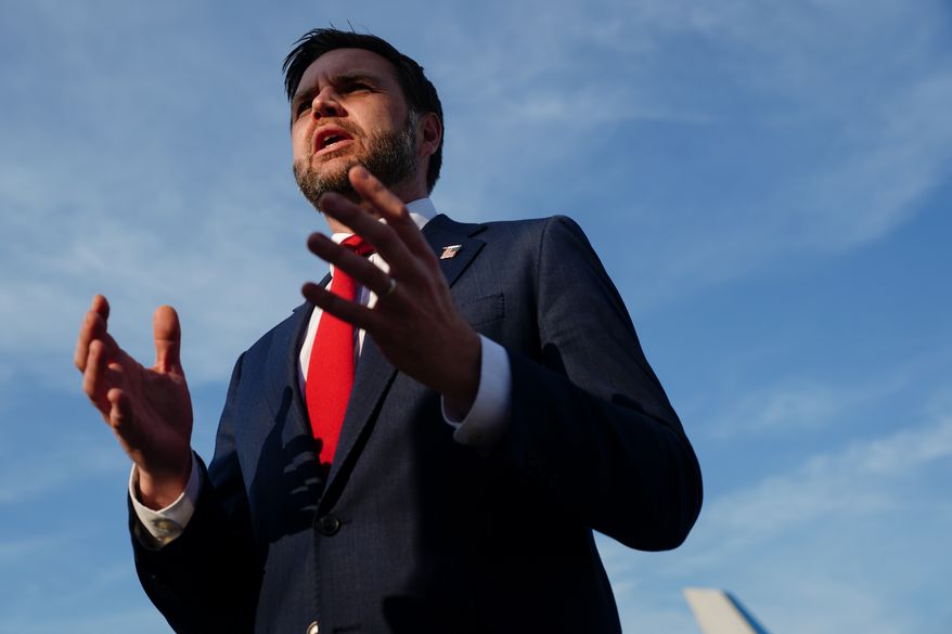 U.S. Vice President JD Vance speaks to members of the media before boarding Air Force Two at Emmen Military Air Base, Emmen, Switzerland, Monday, June 22, 2026, after the U.S. and Iran held high-level talks at the Lake Lucerne Summit. (Nathan Howard/Pool Photo via AP)