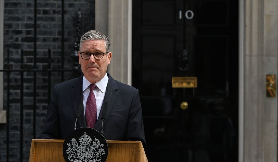 Britain's Prime Minister Keir Starmer speaks to the media outside 10 Downing Street to announce his resignation in London, Monday, June 22, 2026.(AP Photo/Thomas Krych)