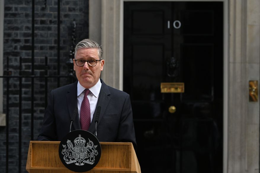 Britain's Prime Minister Keir Starmer speaks to the media outside 10 Downing Street to announce his resignation in London, Monday, June 22, 2026.(AP Photo/Thomas Krych)