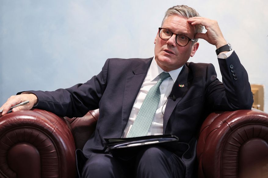 FILE - British Prime Minister Keir Starmer speaks to members of the media in Rome, Sept. 16, 2024. (Phil Noble/Pool Photo via AP, File)