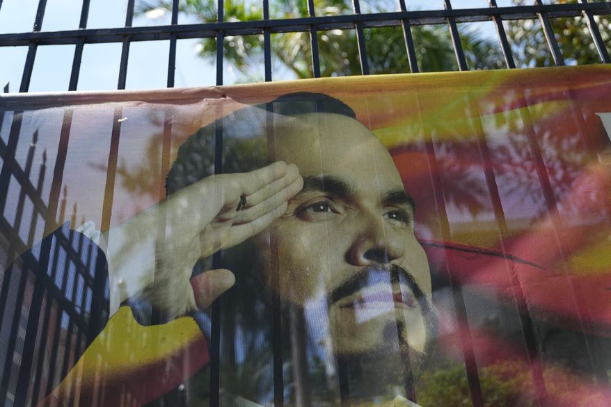 A campaign banner of presidential candidate Abelardo de la Espriella hangs outside his party's headquarters in Barranquilla, Colombia, Monday, June 22, 2026, the day after the presidential election runoff. (AP Photo/Rodrigo Abd)