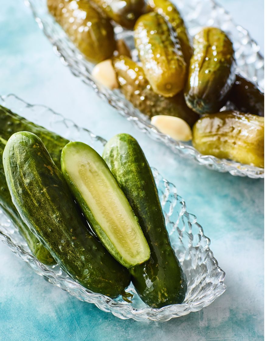 This image released by Voracious shows a recipe for half sour pickles from the cookbook "Cold Canning" by Bruce Weinstein and Mark Scarbrough. (Eric Medsker/Voracious via AP)
