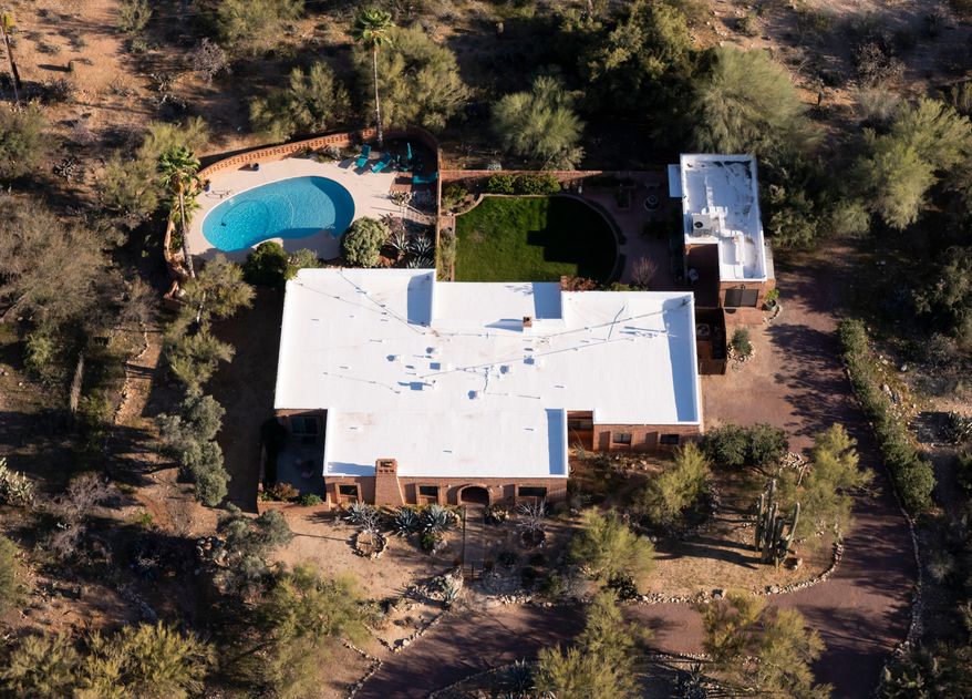 FILE - An aerial view of the home of Nancy Guthrie, the missing mother of "Today" show host Savannah Guthrie, in Tucson, Ariz., on Friday, March 6, 2026,. (AP Photo/Rebecca Noble,File)