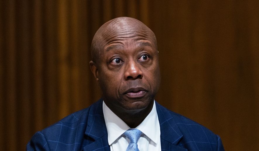 Sen. Tim Scott, R-S.C., asks questions following Treasury Secretary Scott Bessent's testimony before the Senate Committee on Finance hearing to examine the President's proposed budget request for fiscal year 2027, Wednesday, June 3, 2026 in Washington. (AP Photo/Allison Robbert)