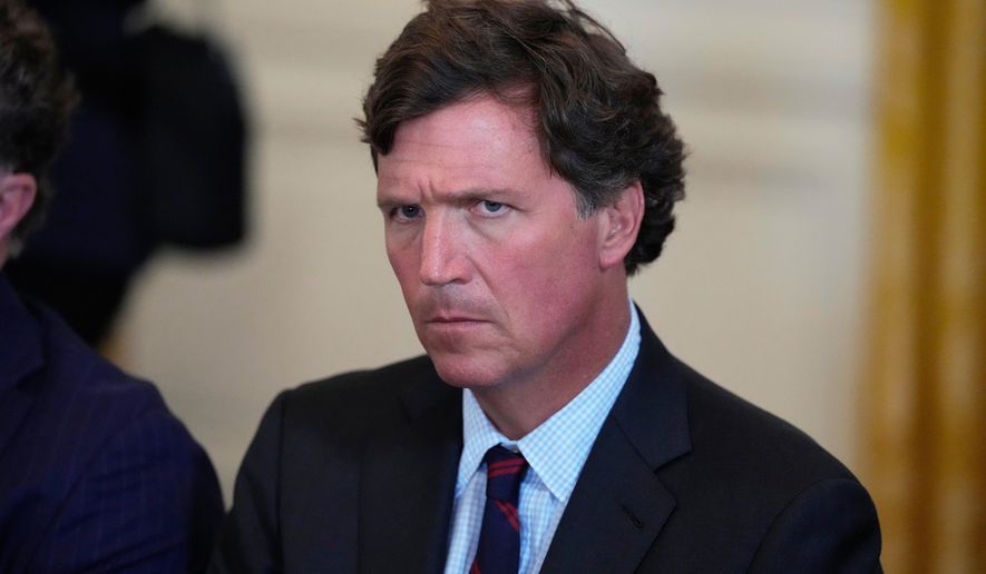 Tucker Carlson attends a meeting with President Donald Trump and oil executives in the East Room of the White House, Jan. 9, 2026, in Washington. (AP Photo/Alex Brandon, File)