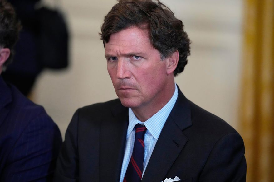 Tucker Carlson attends a meeting with President Donald Trump and oil executives in the East Room of the White House, Jan. 9, 2026, in Washington. (AP Photo/Alex Brandon, File)