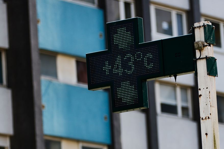 A drugstore sign shows the temperature 43 degrees Celsius (109,4 degrees Fahrenheit) in Rennes, western France, Monday, June 22, 2026. (AP Photo/Jeremias Gonzalez)