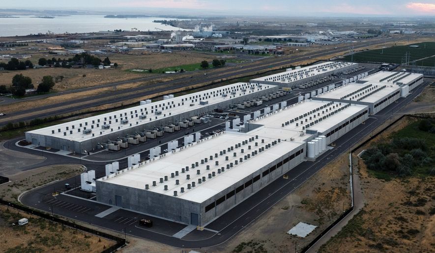FILE - Amazon Web Services data center is visible on Aug. 22, 2024, in Boardman, Ore. (AP Photo/Jenny Kane, File)