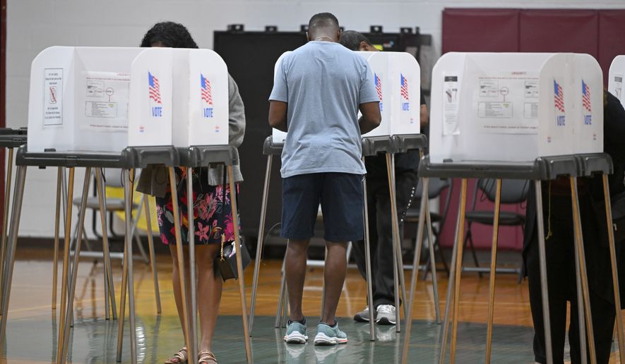 People cast their votes at the Upper Marlboro Community Center Tuesday,, June 23, 2026, in Upper Marlboro, Md. (AP Photo/Gail Burton)