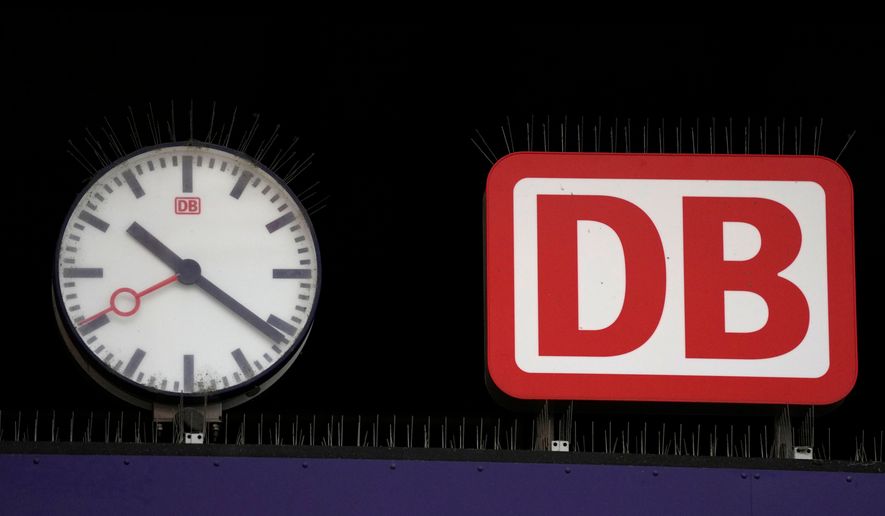 FILE - The logo of Deutsche Bahn is pictured at the central station in Munich, Germany, Jan. 24, 2024. (AP Photo/Matthias Schrader, file)