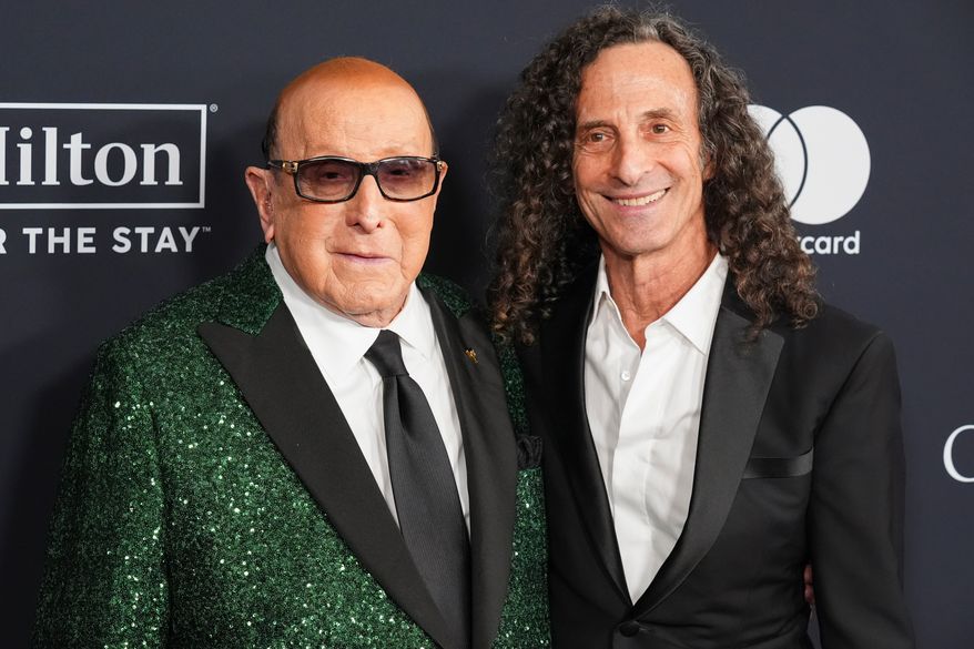 Clive Davis, left, and Kenny G arrive at the Pre-Grammy Gala in Beverly Hills, Calif., on Jan. 31, 2026. (AP Photo/Chris Pizzello, File)