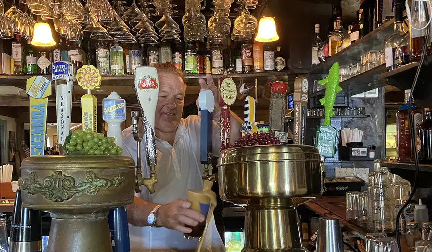 Robert Norden, owner of the Old '76 House, pours a beer in the tavern on Wednesday, June 3, 2026, in Tappan, New York. Mr. Norden says the brew was a favorite of George Washington, who frequented the tavern during the Revolution. (Juliet La Sala / The Washington Times)