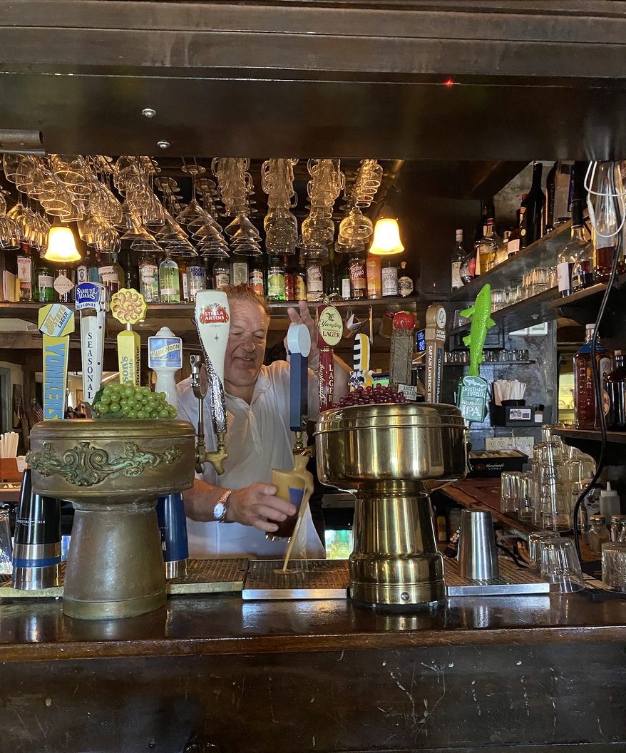 Robert Norden, owner of the Old '76 House, pours a beer in the tavern on Wednesday, June 3, 2026, in Tappan, New York. Mr. Norden says the brew was a favorite of George Washington, who frequented the tavern during the Revolution. (Juliet La Sala / The Washington Times)