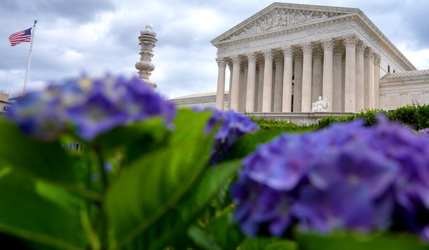 FILE - The U.S. Supreme Court is photographed, June 8, 2026, in Washington. (AP Photo/Mariam Zuhaib, File)