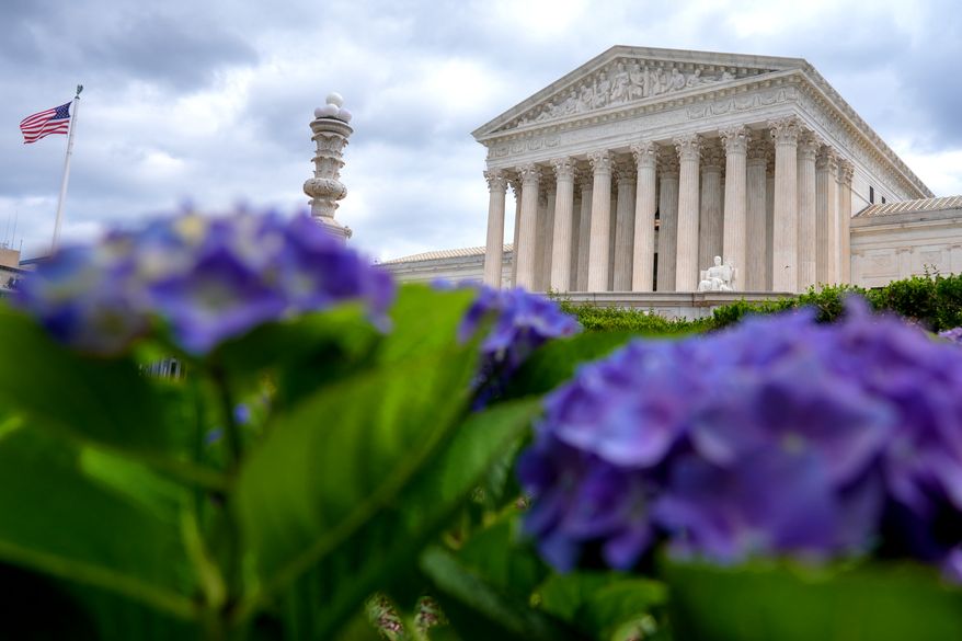 FILE - The U.S. Supreme Court is photographed, June 8, 2026, in Washington. (AP Photo/Mariam Zuhaib, File)