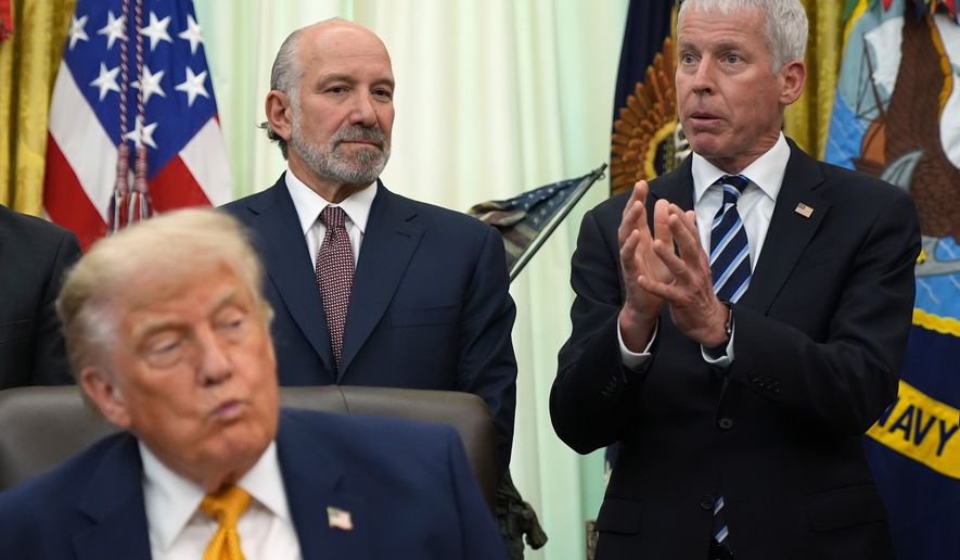 Energy Secretary Chris Wright, from right, speaks as Commerce Secretary Howard Lutnick and President Donald Trump listen in the Oval Office of the White House during an executive order signing about quantum computing, Monday, June 22, 2026, in Washington. (AP Photo/Jacquelyn Martin)