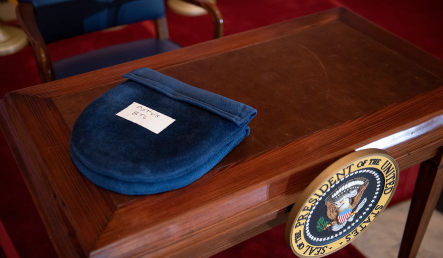 A signing desk is prepared for President Donald Trump to sign the 21st Century ROAD to Housing Act in Statuary Hall, in the Capitol, in Washington, Wednesday, June 24, 2026. (AP Photo/Cliff Owen)