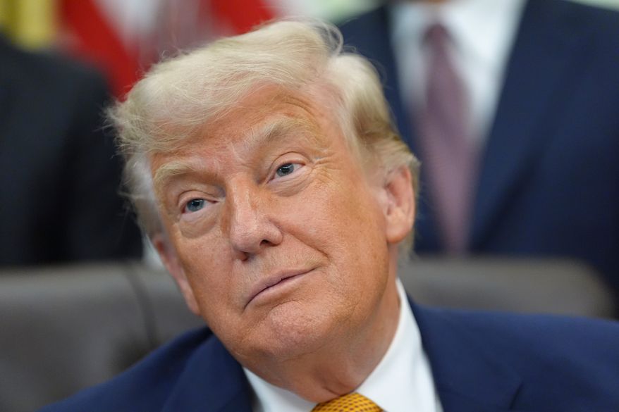 President Donald Trump is pictured in the Oval Office of the White House during an executive order signing about quantum computing, Monday, June 22, 2026, in Washington. (AP Photo/Jacquelyn Martin)