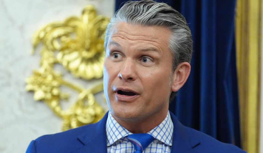 Defense Secretary Pete Hegseth speaks in the Oval Office of the White House during an executive order signing about quantum computing with President Donald Trump, Monday, June 22, 2026, in Washington. (AP Photo/Jacquelyn Martin)