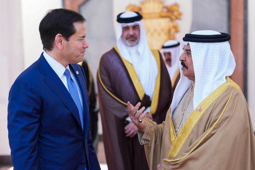 U.S. Secretary of State Marco Rubio, left, and Bahrain's King Hamad bin Isa Al Khalifa share a word after their meeting at Al-Sakhir Palace near Zallaq, Bahrain, Thursday, June 25, 2026. (Eric Lee/Pool Photo via AP) ** FILE **