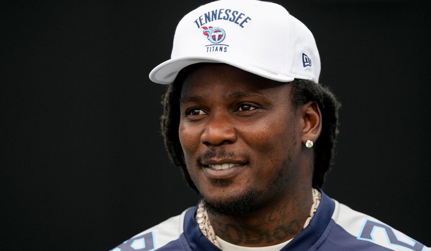 Former Tennessee Titans running back Chris Johnson visits the field during the second half of an NFL football game against the New York Jets, Sept. 15, 2024, in Nashville, Tenn. (AP Photo/George Walker IV, file)