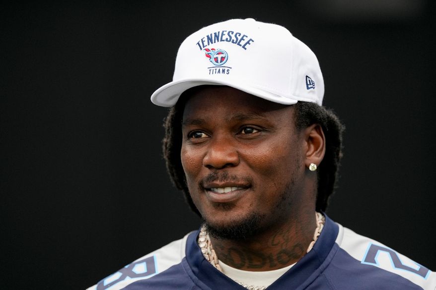 Former Tennessee Titans running back Chris Johnson visits the field during the second half of an NFL football game against the New York Jets, Sept. 15, 2024, in Nashville, Tenn. (AP Photo/George Walker IV, file)