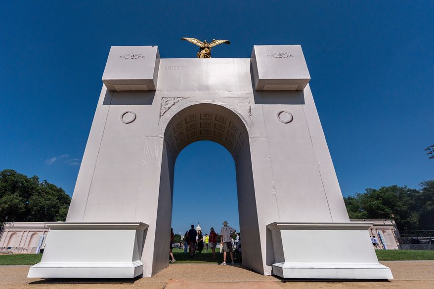 A mockup of President Donald Trump's proposed Triumphal Arch stands at the Great American State Fair on the National Mall, Monday, June 29, 2026, in Washington. (AP Photo/Jen Golbeck)