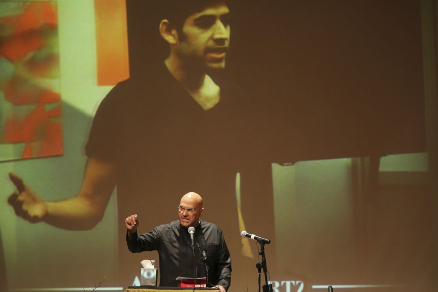 Roy Singham, founder and chairman of Freedom to Connect, speaks during the memorial service for Aaron Swartz, Saturday, Jan. 19, 2013 in New York. Friends and supporters of Swartz paid tribute Saturday to the free-information activist and online prodigy, who killed himself last week as he faced trial on hacking charges. (AP Photo/Mary Altaffer) **FILE**