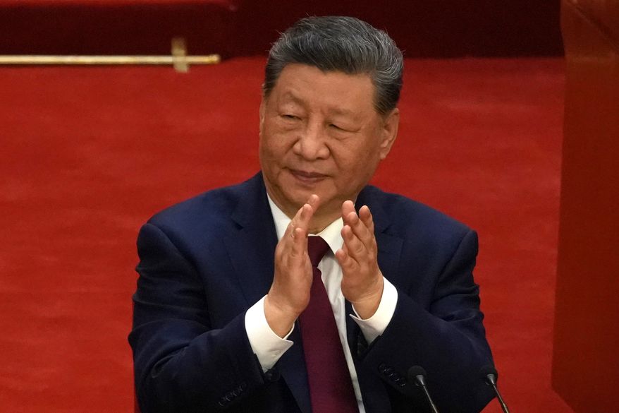 Chinese President Xi Jinping applauds during a ceremony to mark the 105th anniversary of the founding of the Chinese Communist Party at the Great Hall of the People in Beijing, Wednesday, July 1, 2026. (AP Photo/Ng Han Guan)