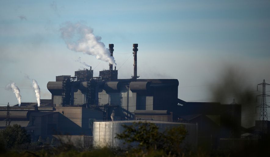 The ArcelorMittal steel plant sits in Fos-sur-Mer, southern France, Monday, Nov. 7, 2022.(AP Photo/Daniel Cole, File)
