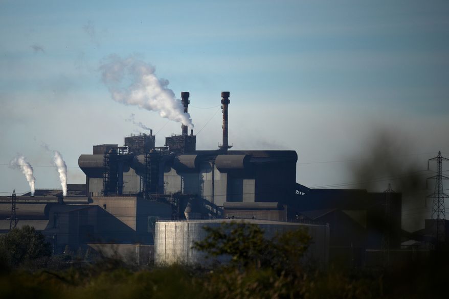 The ArcelorMittal steel plant sits in Fos-sur-Mer, southern France, Monday, Nov. 7, 2022.(AP Photo/Daniel Cole, File)