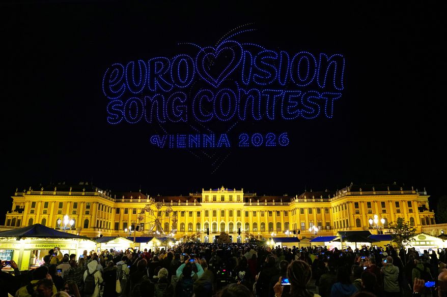FILE - 3000 drones depicts the logo sign in preparation for the upcoming Eurovision Song Contest in front of castle Schonbrunn in Vienna, Austria, on April 27, 2026. (AP Photo/Matthias Schrader, File)