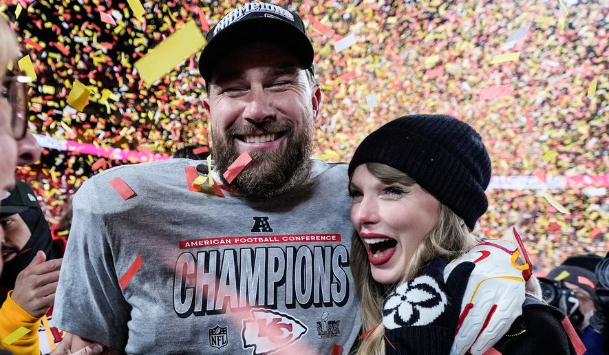 Travis Kelce, left, and Taylor Swift pose after the AFC Championship NFL football game against the Buffalo Bills, Jan. 26, 2025, in Kansas City, Mo. (AP Photo/Ashley Landis, File)