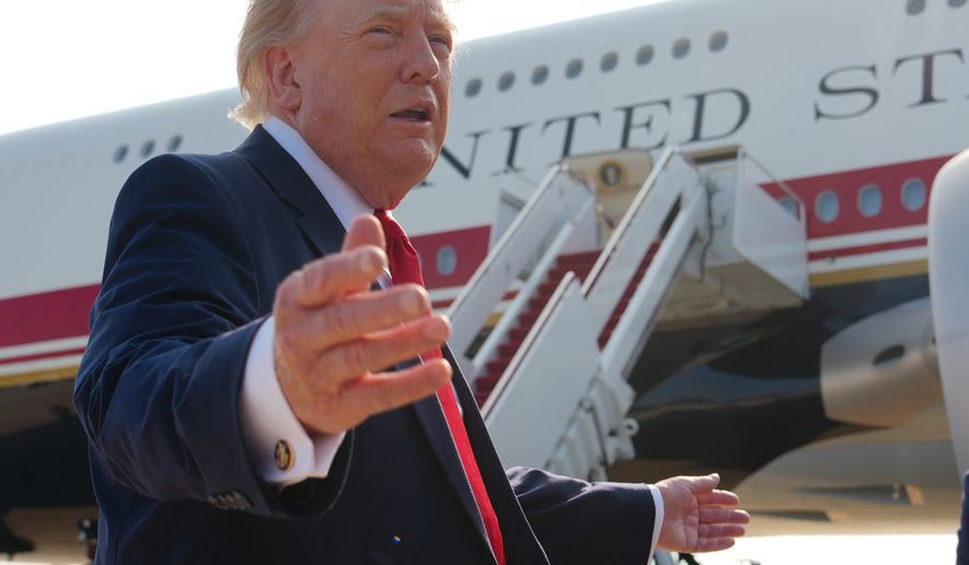 President Donald Trump speaks to reporters before boarding Air Force One, Wednesday, July 1, 2026, at Joint Base Andrews, Md. (AP Photo/Julia Demaree Nikhinson)