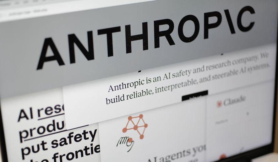 Pages from the Anthropic website and the company's logo are displayed on a computer screen in New York, Feb. 26, 2026. (AP Photo/Patrick Sison, File)