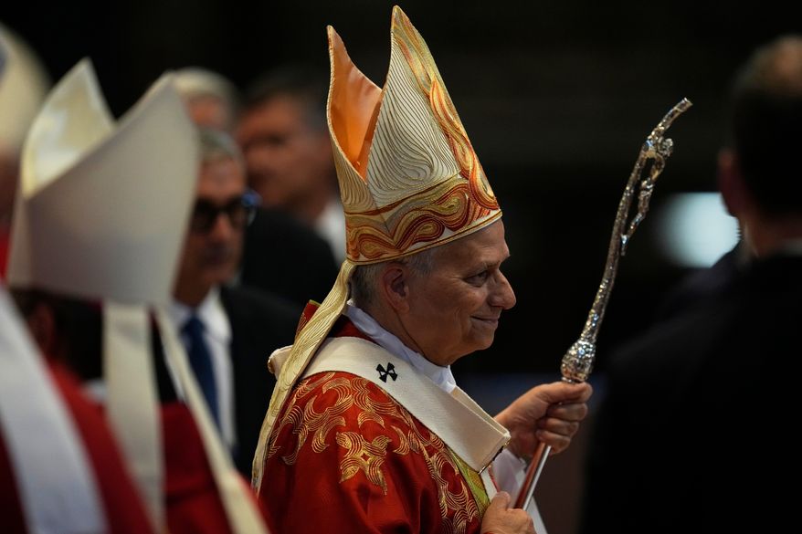 Pope Leo XIV leaves after a Mass where he conferred the pallium on newly appointed metropolitan archbishops, in St. Peter's Basilica, at the Vatican, Monday, June 29, 2026. (AP Photo/Alessandra Tarantino)