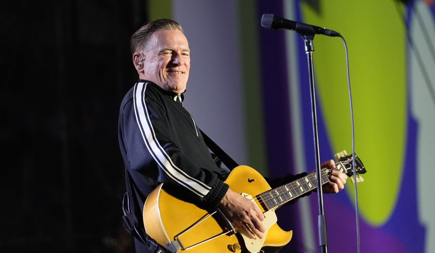 Bryan Adams performs during a countdown concert ahead of the World Cup soccer tournament on Wednesday, June 10, 2026, in Toronto. (AP Photo/Stephanie Scarbrough)