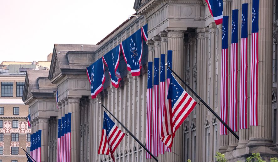 The Commerce Department is decorated for the Fourth of July celebration, Thursday, July 2, 2026, in Washington. (AP Photo/Alex Brandon)