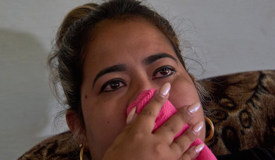 Cancer patient Irisleydis Trista Calzadilla cries during an interview at her home in Batabano, Cuba, Friday, June 26, 2026. (AP Photo/Ramon Espinosa)