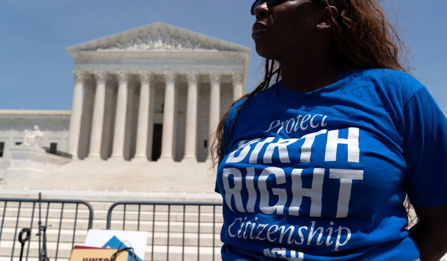 Activists celebrate the Supreme Court's birthright citizenship ruling outside of the Supreme Court on Capitol Hill, Tuesday, June 30, 2026, in Washington. (AP Photo/Jose Luis Magana)