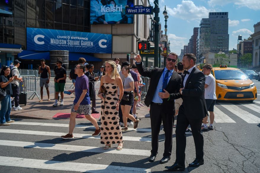 Guests arrive to Madison Square Garden ahead of a reported wedding between singer Taylor Swift and National Football League player Travis Kelce on Friday, July 3, 2026, in New York. (AP Photo/Ryan Murphy)
