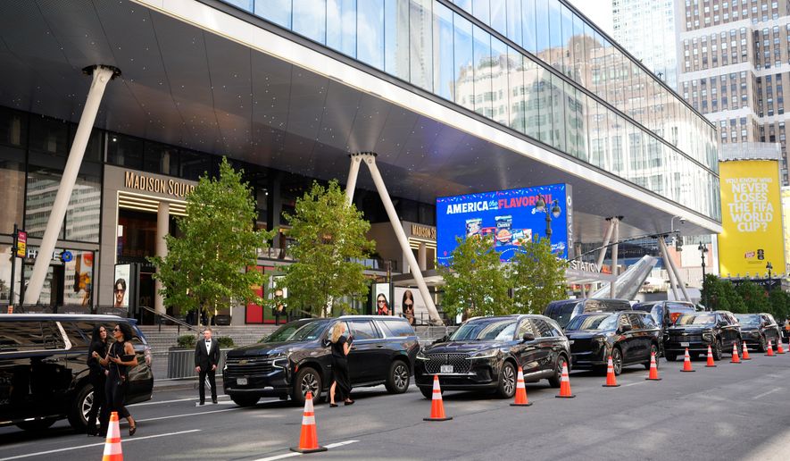 SUVs line up outside Madison Square Garden for drop off to a reported wedding between Taylor Swift and Travis Kelce on Friday, July 3, 2026, in New York. (Photo by Charles Sykes/Invision/AP)