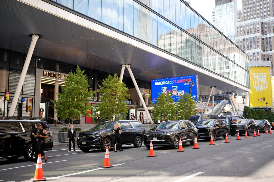 SUVs line up outside Madison Square Garden for drop off to a reported wedding between Taylor Swift and Travis Kelce on Friday, July 3, 2026, in New York. (Photo by Charles Sykes/Invision/AP)