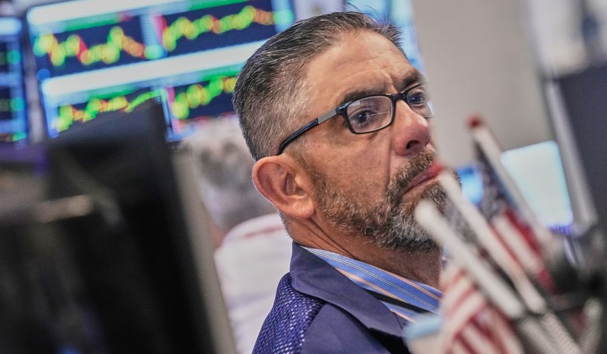 Trader Robert Oswald works on the floor of the New York Stock Exchange, Thursday, June 25, 2026. (AP Photo/Richard Drew)