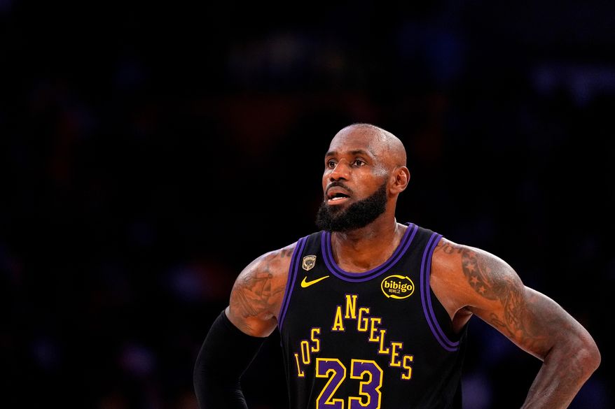 Los Angeles Lakers forward LeBron James stands on the court in the closing minutes of Game 4 in a second-round NBA basketball playoff series against the Oklahoma City Thunder, May 11, 2026, in Los Angeles. (AP Photo/Mark J. Terrill, File)