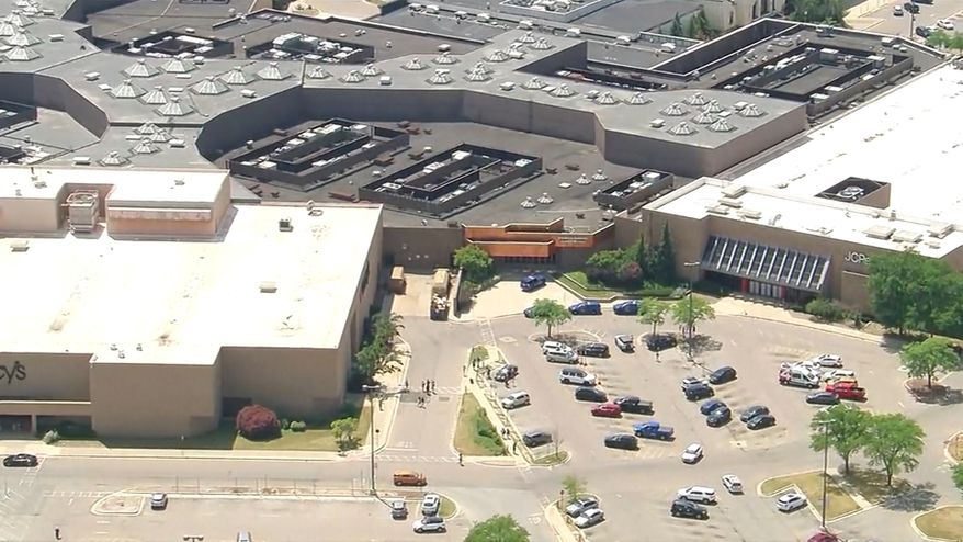 Law enforcement respond to a shooting at a shopping mall in the city of Dearborn, Mich., on Friday, July 3, 2026. (WXYZ via AP)