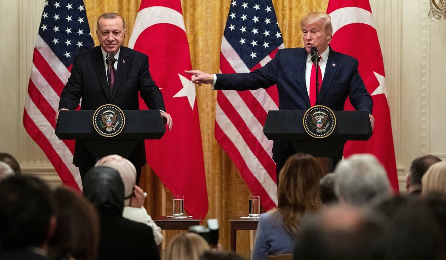 FILE - President Donald Trump speaks during a news conference with Turkish President Recep Tayyip Erdogan in the East Room of the White House, Nov. 13, 2019, in Washington. (AP Photo/ Evan Vucci, File)