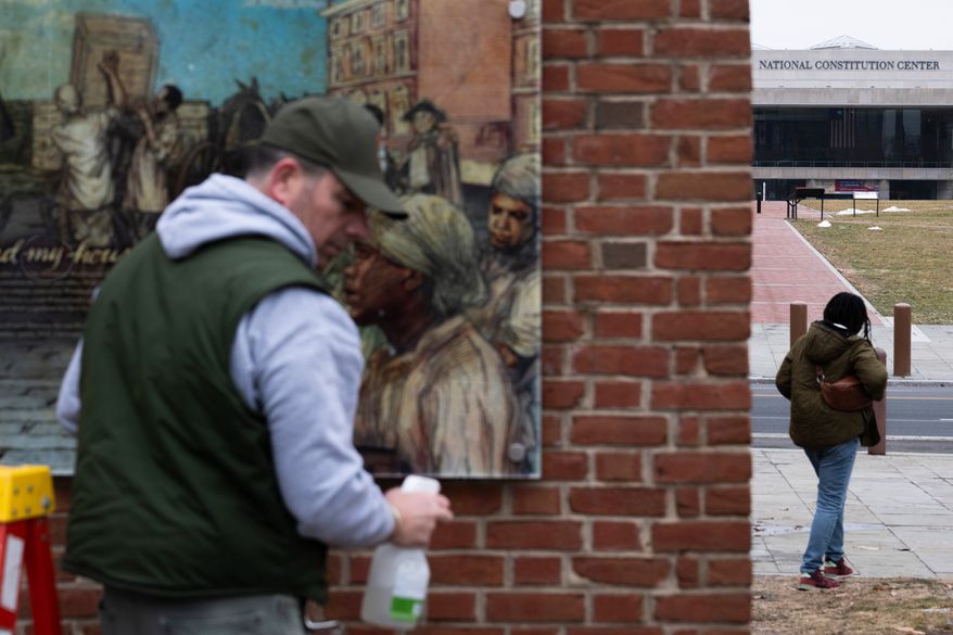 Panels that were part of an exhibit on slavery at the President's House Site in Independence National Historical Park are reinstalled, Feb. 19, 2026, in Philadelphia. (AP Photo/Joe Lamberti, File)