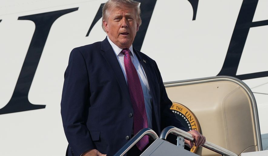 President Donald Trump boards Air Force One, Friday, July 3, 2026, at Joint Base Andrews, Md. , for a trip to Mt. Rushmore. (AP Photo/Alex Brandon)