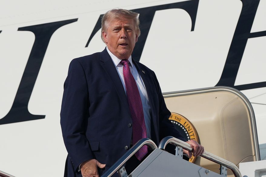 President Donald Trump boards Air Force One, Friday, July 3, 2026, at Joint Base Andrews, Md. , for a trip to Mt. Rushmore. (AP Photo/Alex Brandon)